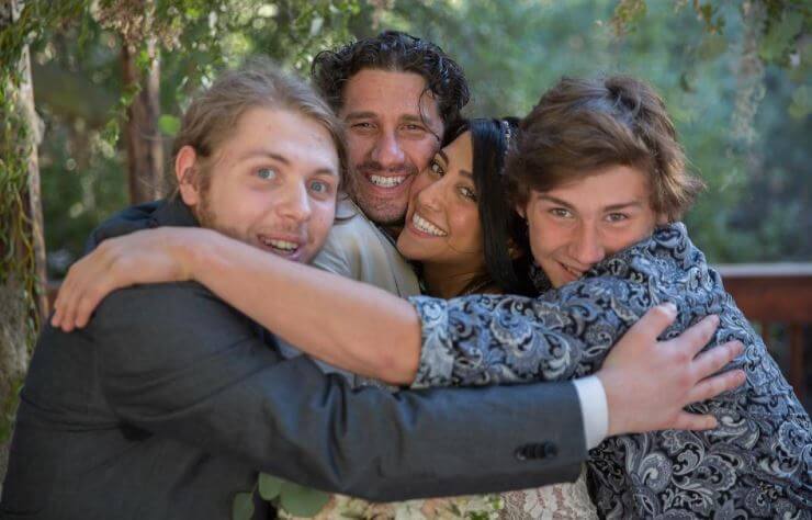 Jacob Willis with his father, Wil Willis, brother, and step-mom.